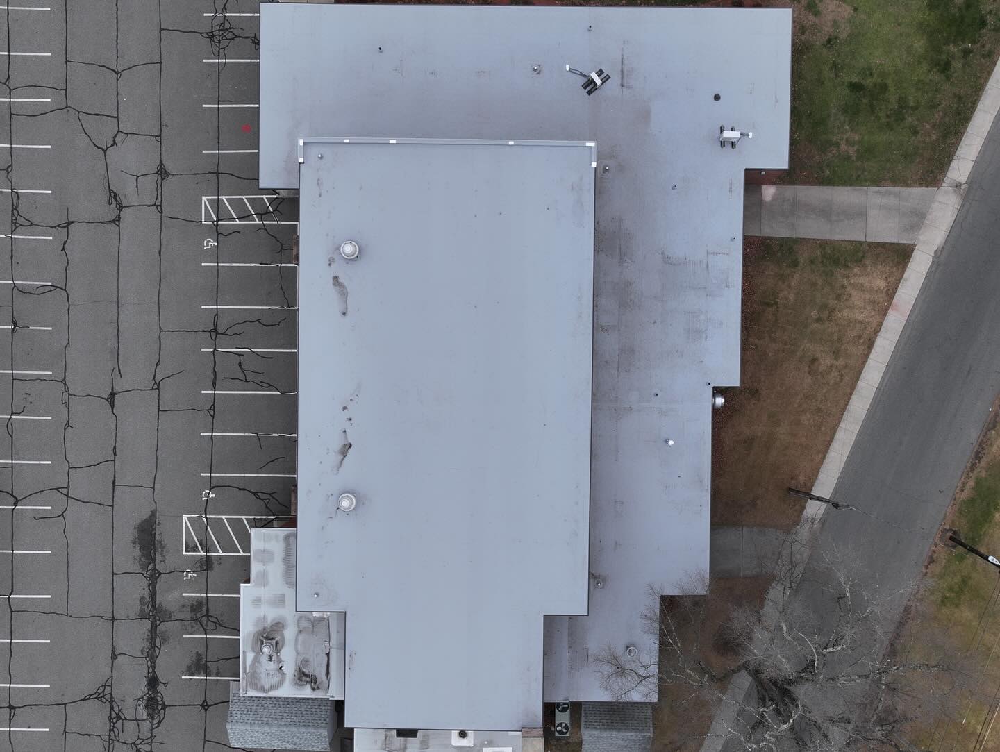 Flat Roof Seam Failure: The Silent Cause of Commercial Building Water Damage