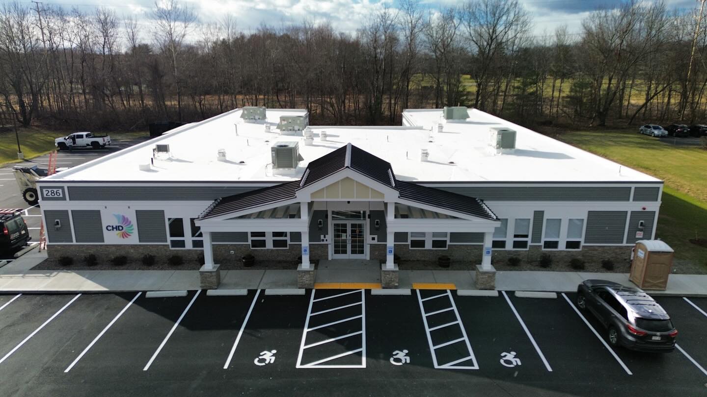 front view from above of CHD building in Longmeadow MA which shows the new roof installation completed by tech roofing services