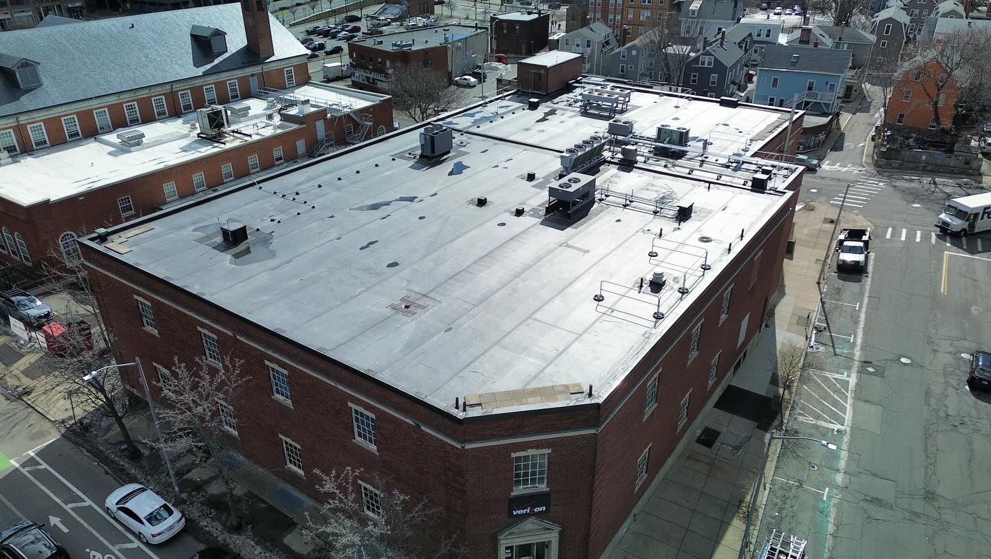 overhead view of completed roofing project done by tech roofing