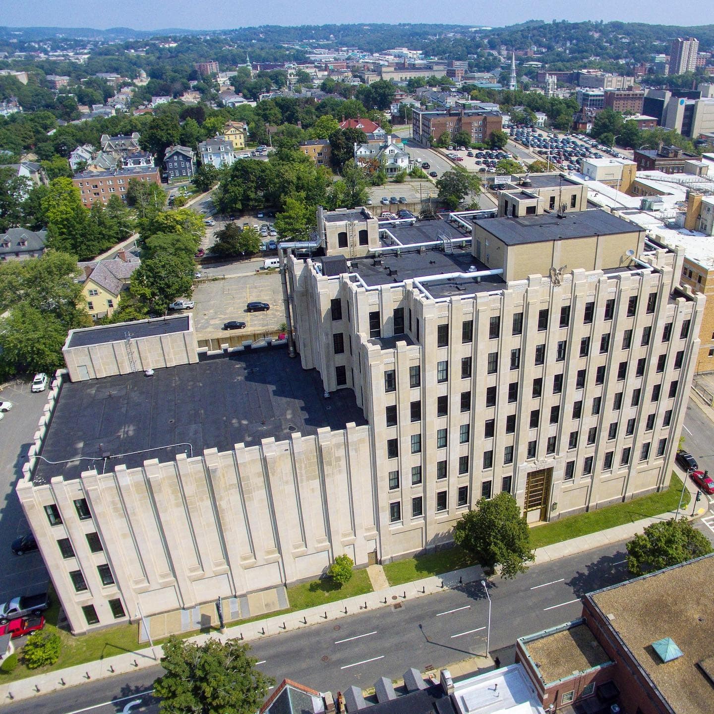 Aerial view of a flat commercial roof in Worcester, MA after a Carlisle EPDM roof replacement completed by Tech Roofing.